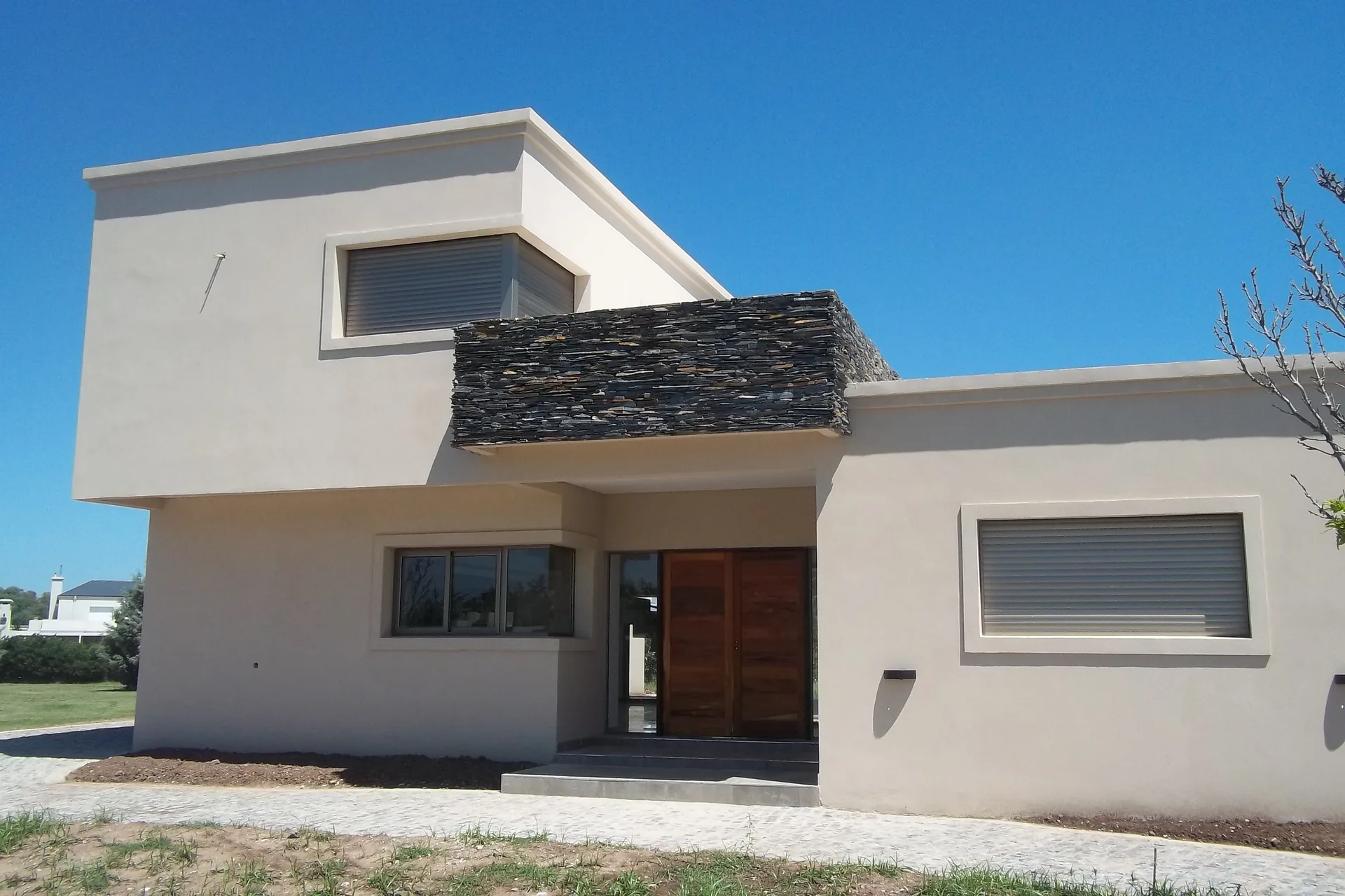 Casa Moderna Llave en Mano en Barrio Kentucky con Terminaciones Premium en Rosario - Arquitectura en Rosario